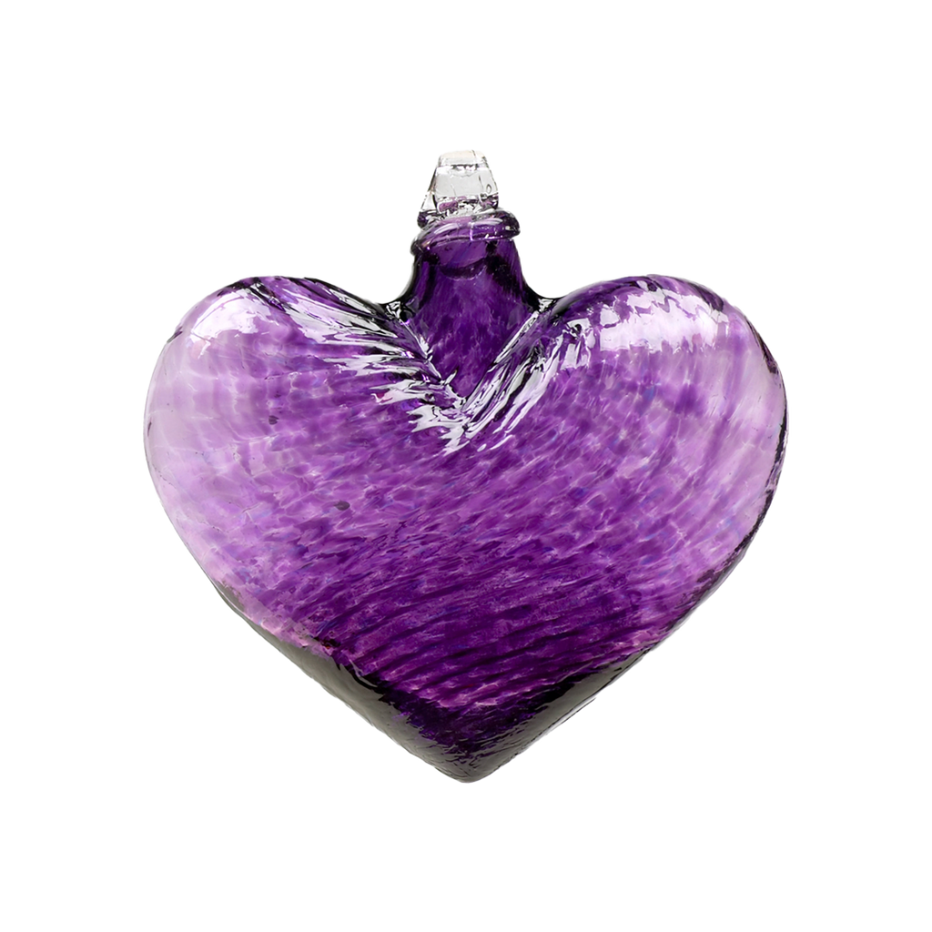Purple glass heart on a transparent background.