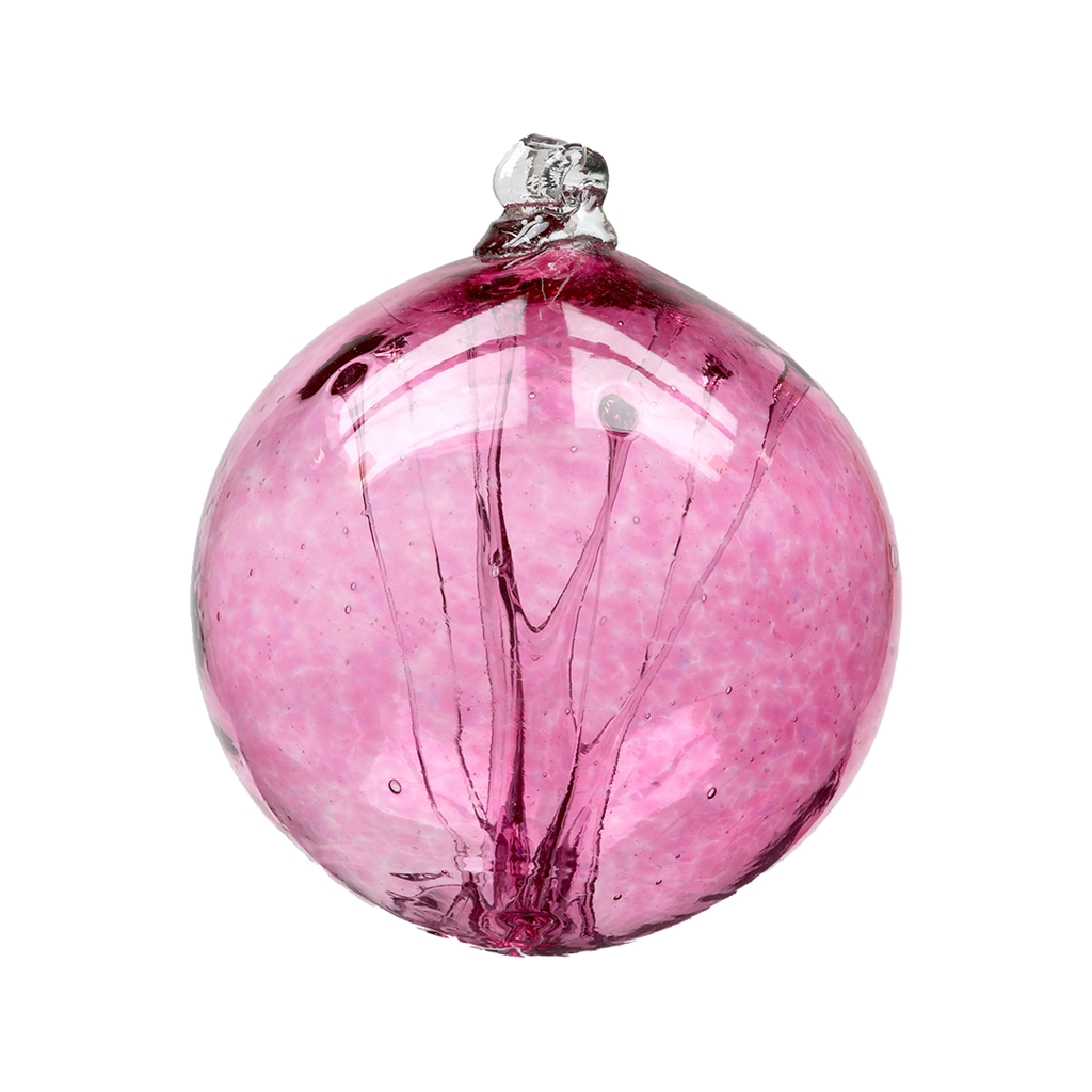 Pink glass orb with webbing pulled from bottom to top on a transparent background.