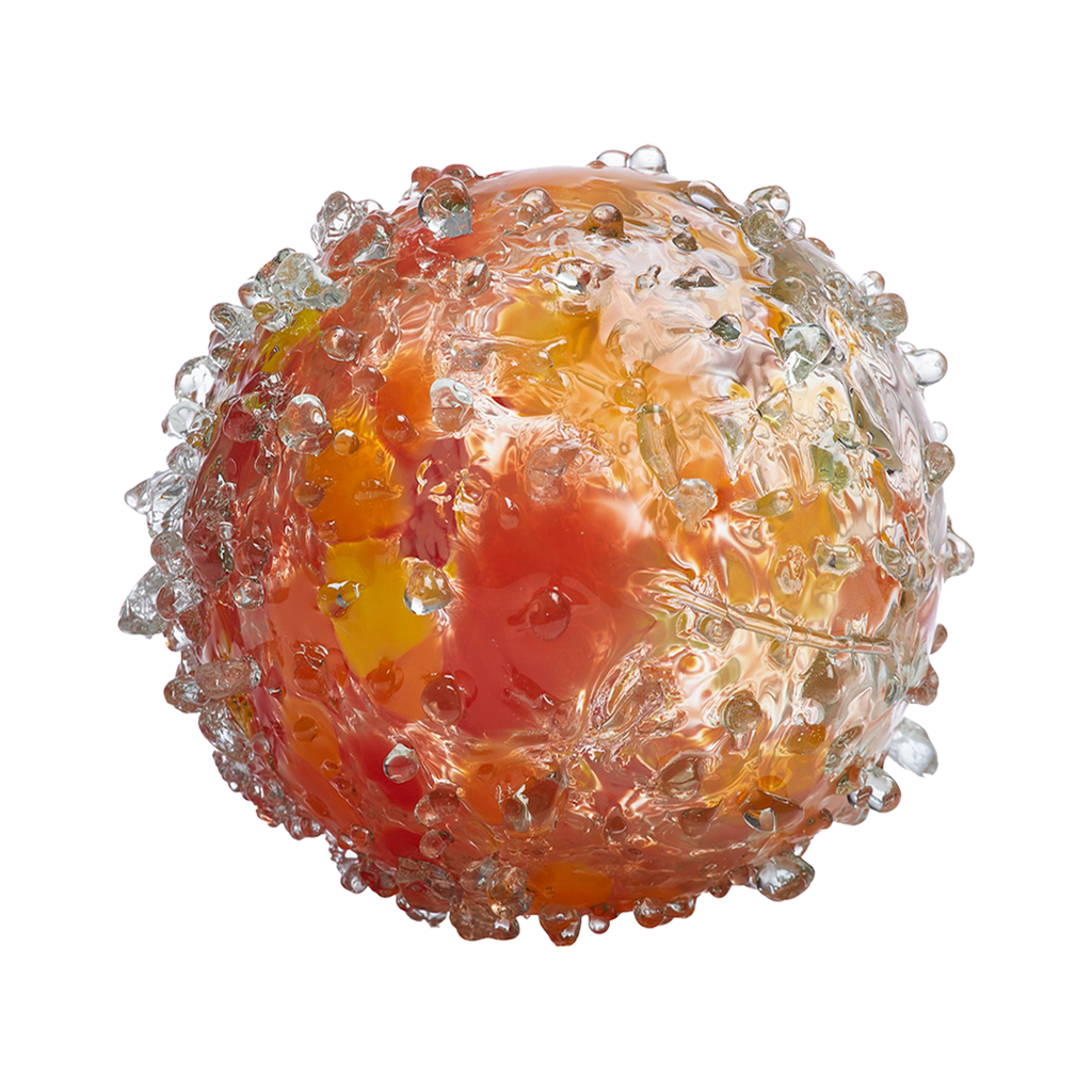 Glass orb with orange and red glass covering the surface, along with pebbled clear glass. All on a transparent background. 