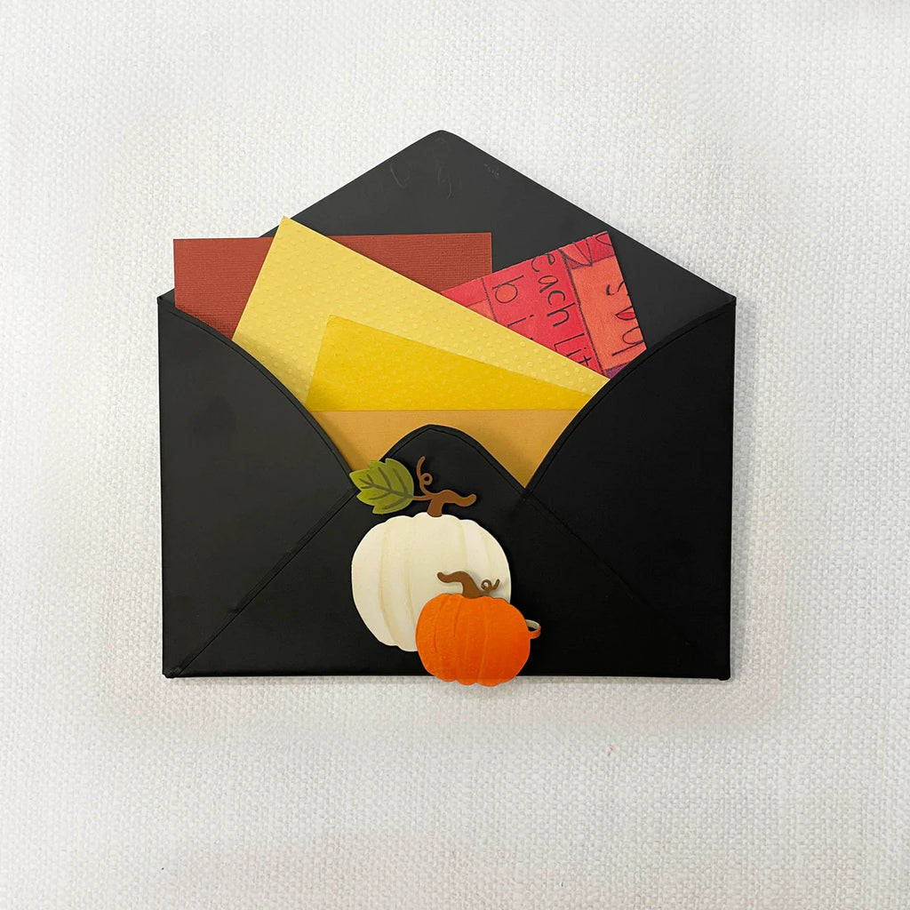 Pumpkins Magnet on a black envelope memo holder with letters inside. 
