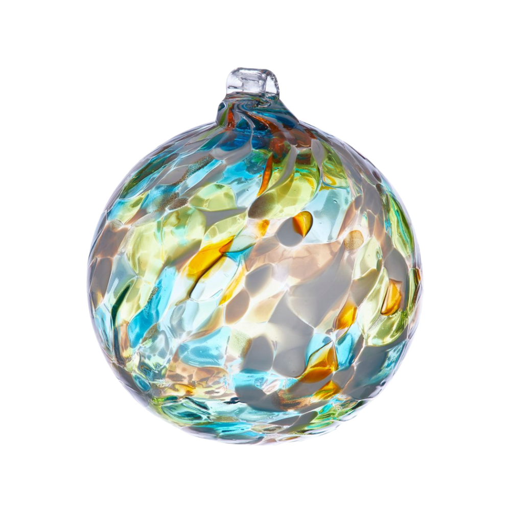 Round glass ball with white, orange, lime and teal glass mosaiced around the entire surface on a transparent background. 