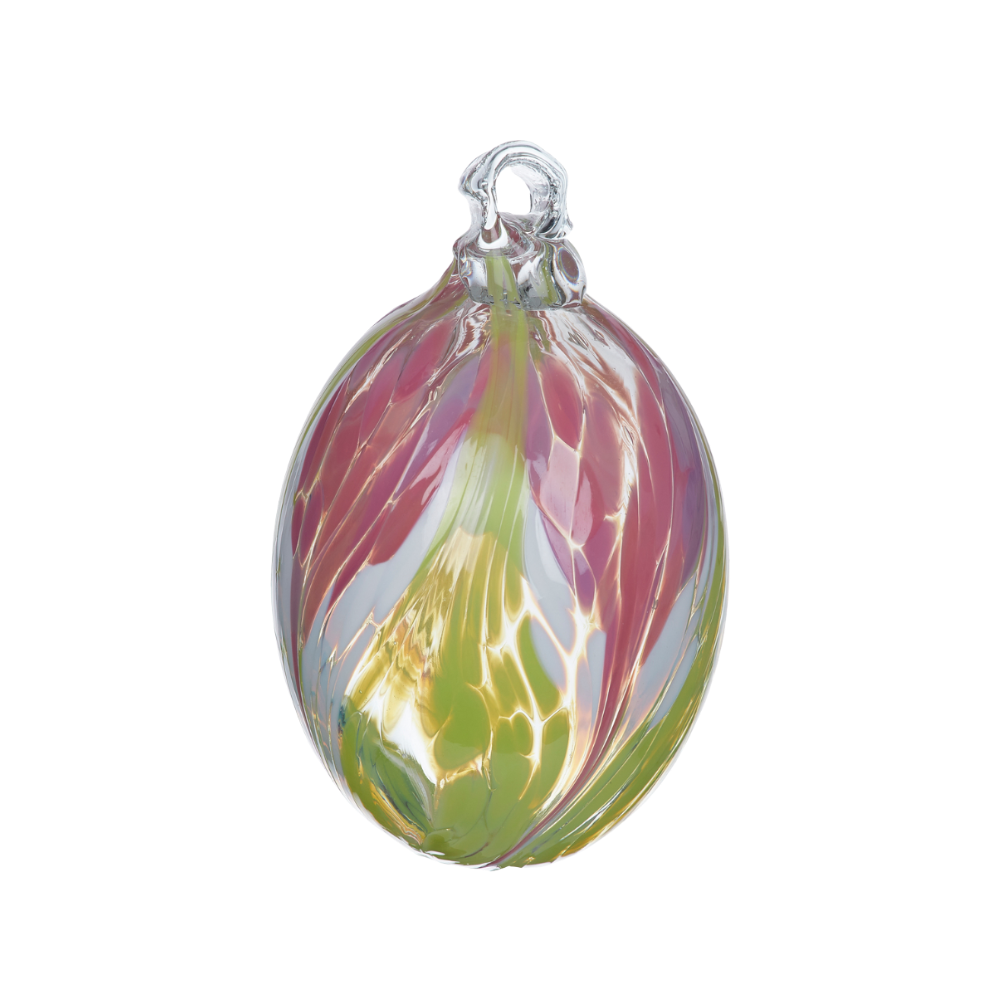 Oval glass orb covered with opaque glass. Pink on top, white in the middle and lime on the bottom on a transparent background.