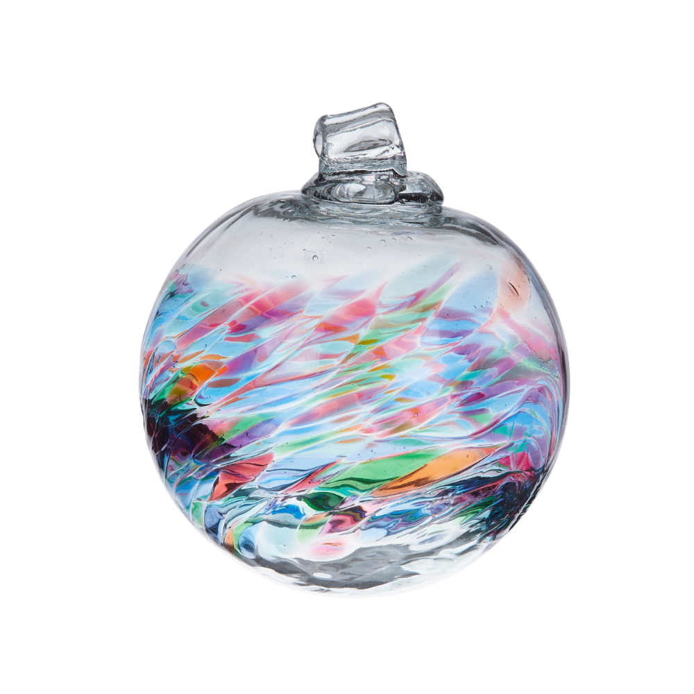 Glass orb with teal, purple, pink, orange, green and blue coloured glass around the middle and horizontal webbing on a transparent background.