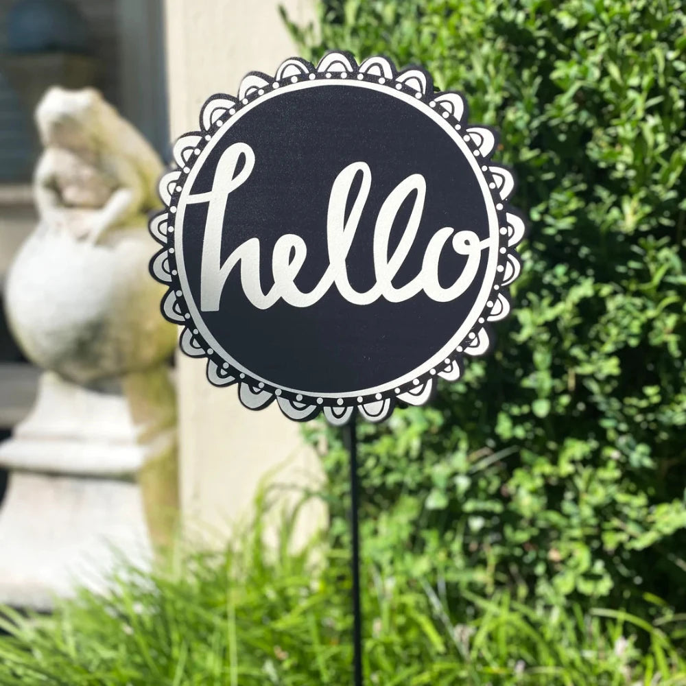 Hello Art Pop Magnet in a garden