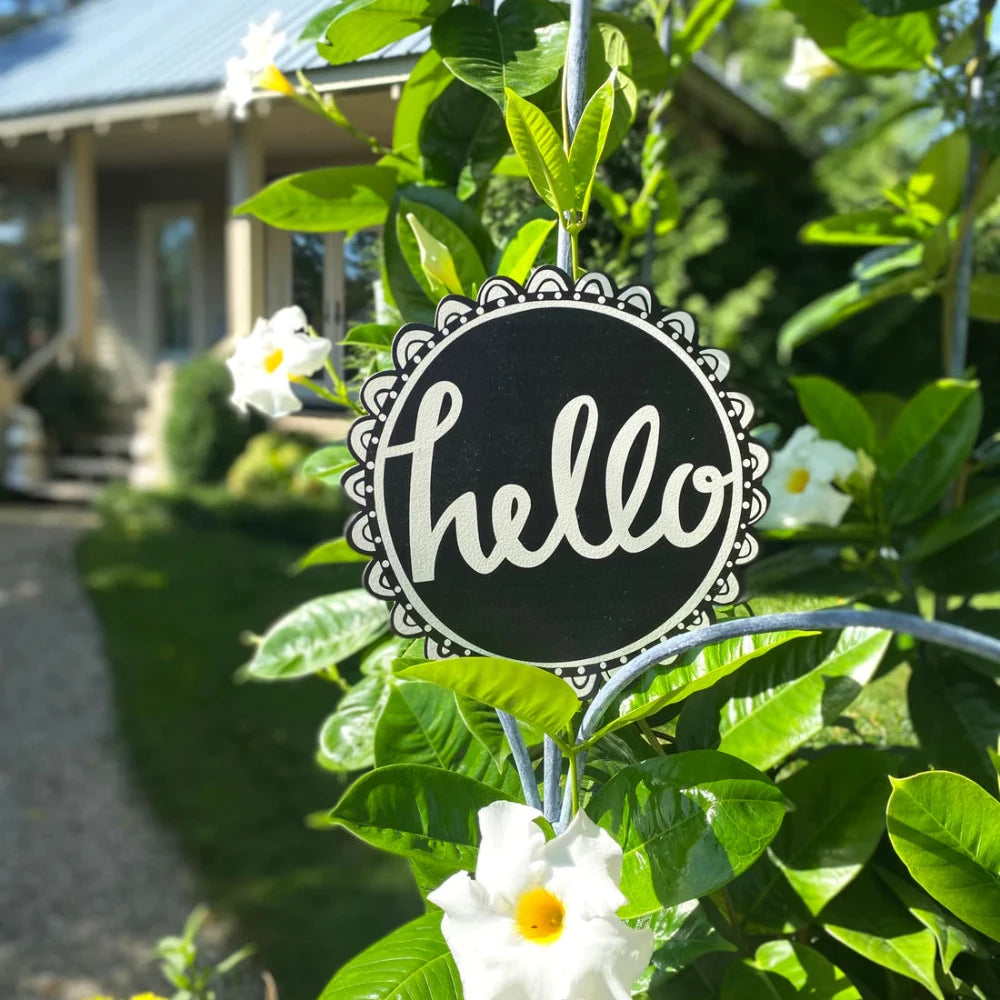 Hello Art Pop Magnet in a garden